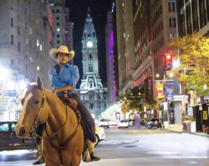 The Concrete Cowgirl – Erin Brown (Riding Kidd in Center City Philadelphia) Photographer: Ricky Codio